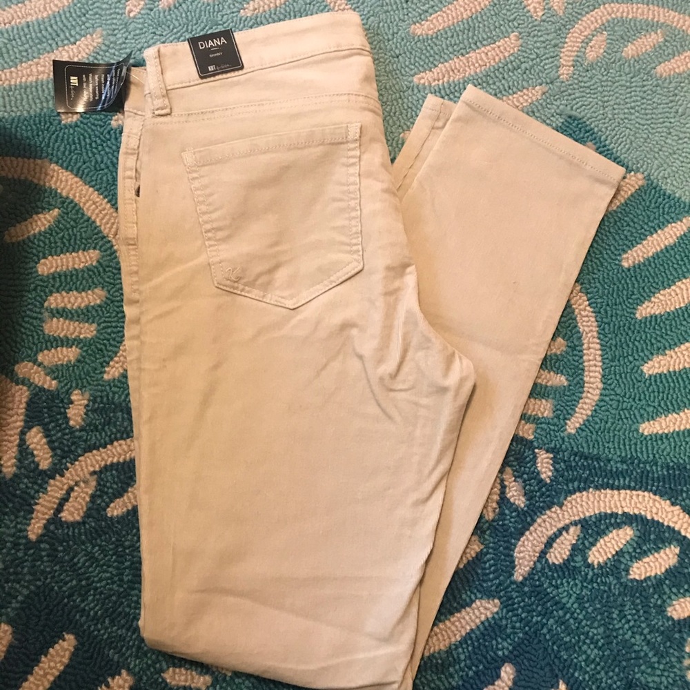 Tan corduroy skinny pants.
